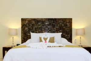 Postel nebo postele na pokoji v ubytování Cielo Maya Beach Tulum
