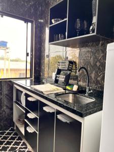 Dapur atau dapur kecil di Apartamento 600 metros do mar, 14 minutos do centro de Torres +19 gambar