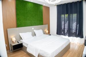 Postel nebo postele na pokoji v ubytování Résidence CAKFS