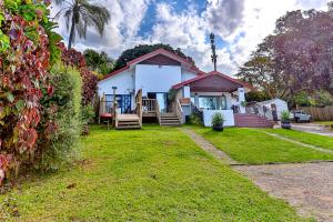 a house with a lawn in front of it at Rembrandt in Ballito