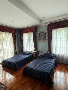 Ένα ή περισσότερα κρεβάτια σε δωμάτιο στο Villa de Jano