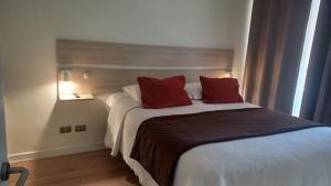 Postel nebo postele na pokoji v ubytování Apart Ingal