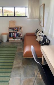 Posezení v ubytování Summerhouse By The Heath Near The North Sea