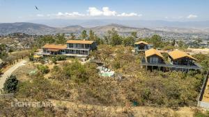 an aerial view of a house on a hill at Utopia Casas Boutique in Oaxaca City