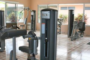 a gym with several tread machines in a room at Punta Chame Club and Resort in Chame
