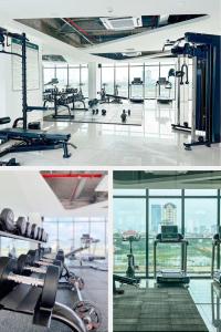 einen Fitnessraum mit Stadtblick in der Unterkunft ChouHouse's Homestay in Hue City 2 in Thôn Văn Dương