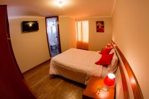Letto o letti in una camera di Cusco House