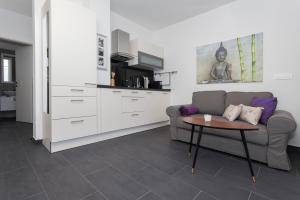 Kuchyňa alebo kuchynka v ubytovaní Apartments Svetec