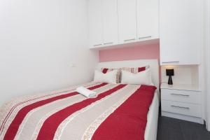 Posteľ alebo postele v izbe v ubytovaní Apartments Svetec