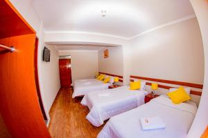 Letto o letti in una camera di Cusco House