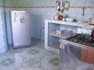 Kuchyň nebo kuchyňský kout v ubytování Hostal Alcazaba