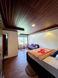 Ένα ή περισσότερα κρεβάτια σε δωμάτιο στο Sakura Hotel