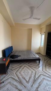 Postel nebo postele na pokoji v ubytování Auralis Stay