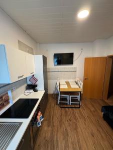 Kuchyň nebo kuchyňský kout v ubytování Apartment Fabiola Hamberg strasse 34 in Siegen + 33 fotografií