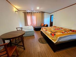 Ένα ή περισσότερα κρεβάτια σε δωμάτιο στο Sakura Hotel +19 φωτογραφίες