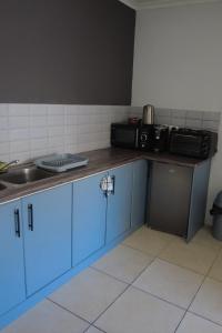 Køkken eller tekøkken på Studio Flat Bayside + 9 billeder