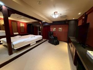 Voodi või voodid majutusasutuse Hotel Rima chocolat toas