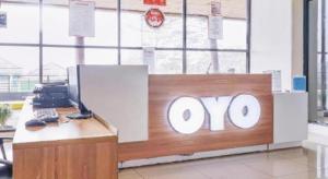 an office with a desk with the oo sign on it at Super OYO Capital O 483 Tamansari Panoramic Bandung in Bandung +100 photos