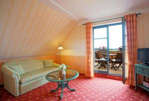 TV a/nebo společenská místnost v ubytování Hotel Godewind