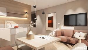 a kitchen and living room with a table and a couch at Vista Apartments in Seefeld in Tirol