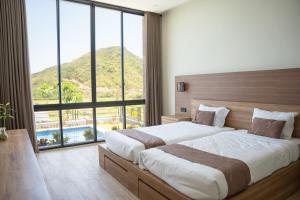 Postel nebo postele na pokoji v ubytování Maya Ocean Resort + 118 fotografií