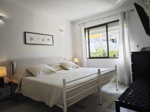 Postel nebo postele na pokoji v ubytování Apartamento Puebla Lucia Fuengirola + 14 fotografií