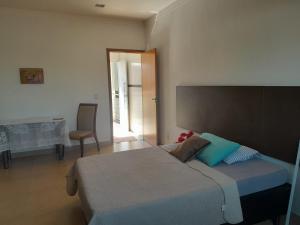 Ένα ή περισσότερα κρεβάτια σε δωμάτιο στο Flats Santa Genoveva +25 φωτογραφίες