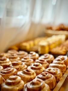 a bunch of donuts sitting on a table at Hotel Nosal Ski & Wine in Zakopane