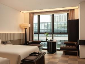 Postel nebo postele na pokoji v ubytování SAVHE Hotel Guangzhou Financial City - Free night snacks and afternoon tea-Free Self-service laundry + 49 fotografií