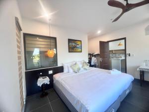 Ένα ή περισσότερα κρεβάτια σε δωμάτιο στο Betel Hoi An Homestay +22 φωτογραφίες