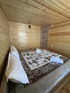 Postel nebo postele na pokoji v ubytování Hotel Zghapari