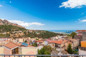 a view of a town on a hill at Sa Omu 'Eccia in Villagrande Strisaili