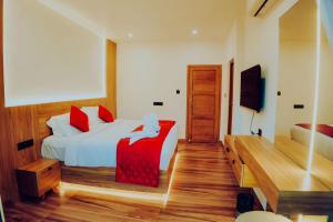 Postel nebo postele na pokoji v ubytování Zaad Suites + 12 fotografií