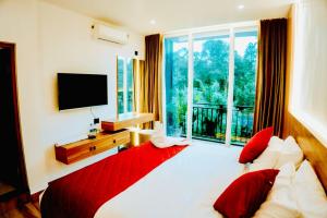 Postel nebo postele na pokoji v ubytování Zaad Suites