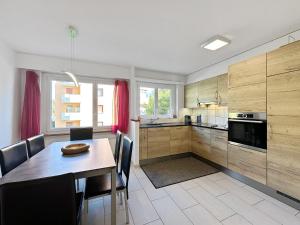 Kuchyň nebo kuchyňský kout v ubytování Casa Alps Sion - Swiss Alps