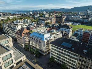 an aerial view of a city with buildings at PopUp - Stay3 self check in Apartments in Zürich