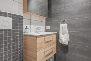 Et badeværelse på Haus Dienten TOP 4 + 14 billeder