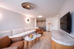 TV a/nebo společenská místnost v ubytování Nik Palas Luxury Residence