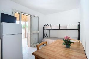 Kuchyň nebo kuchyňský kout v ubytování Villaggio Sabbia d'oro