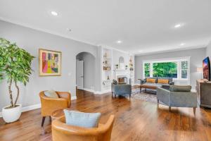 a living room with chairs and a couch at The Wexford French Chateau w Pool in Athens