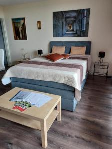 Postel nebo postele na pokoji v ubytování Ferien-Appartement Vier Jahreszeiten