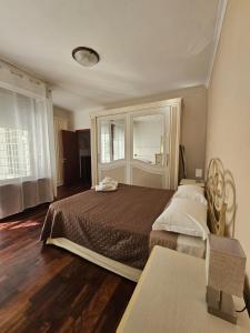 En eller flere senge i et værelse på Dream & Fly Ombrine