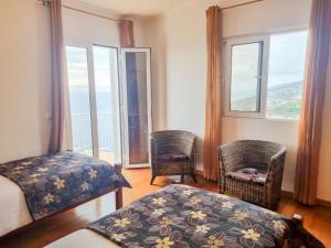 Postel nebo postele na pokoji v ubytování Loreto Rose, Panoramic Ocean and Mountain View + 47 fotografií