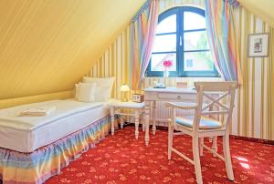 Postel nebo postele na pokoji v ubytování Hotel Godewind