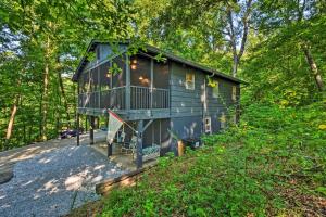 a tiny house in the middle of the woods at New Listing Blue Haven Nest w Dock in Martin
