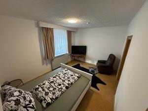 Posezení v ubytování Ferienhaus WorkersParadise + 3 fotografie