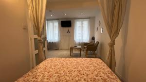 Ένα ή περισσότερα κρεβάτια σε δωμάτιο στο Zen Studio Center Toulon