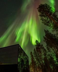 an image of the northern lights in the sky at Levi OloResort in Levi
