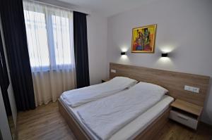 Postel nebo postele na pokoji v ubytování Guest House Colori