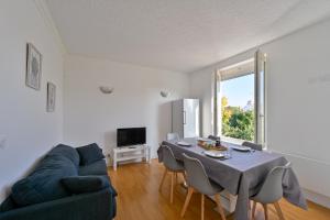 TV a/nebo společenská místnost v ubytování L'Escale Brièronne - Confortable au cœur de la Brière